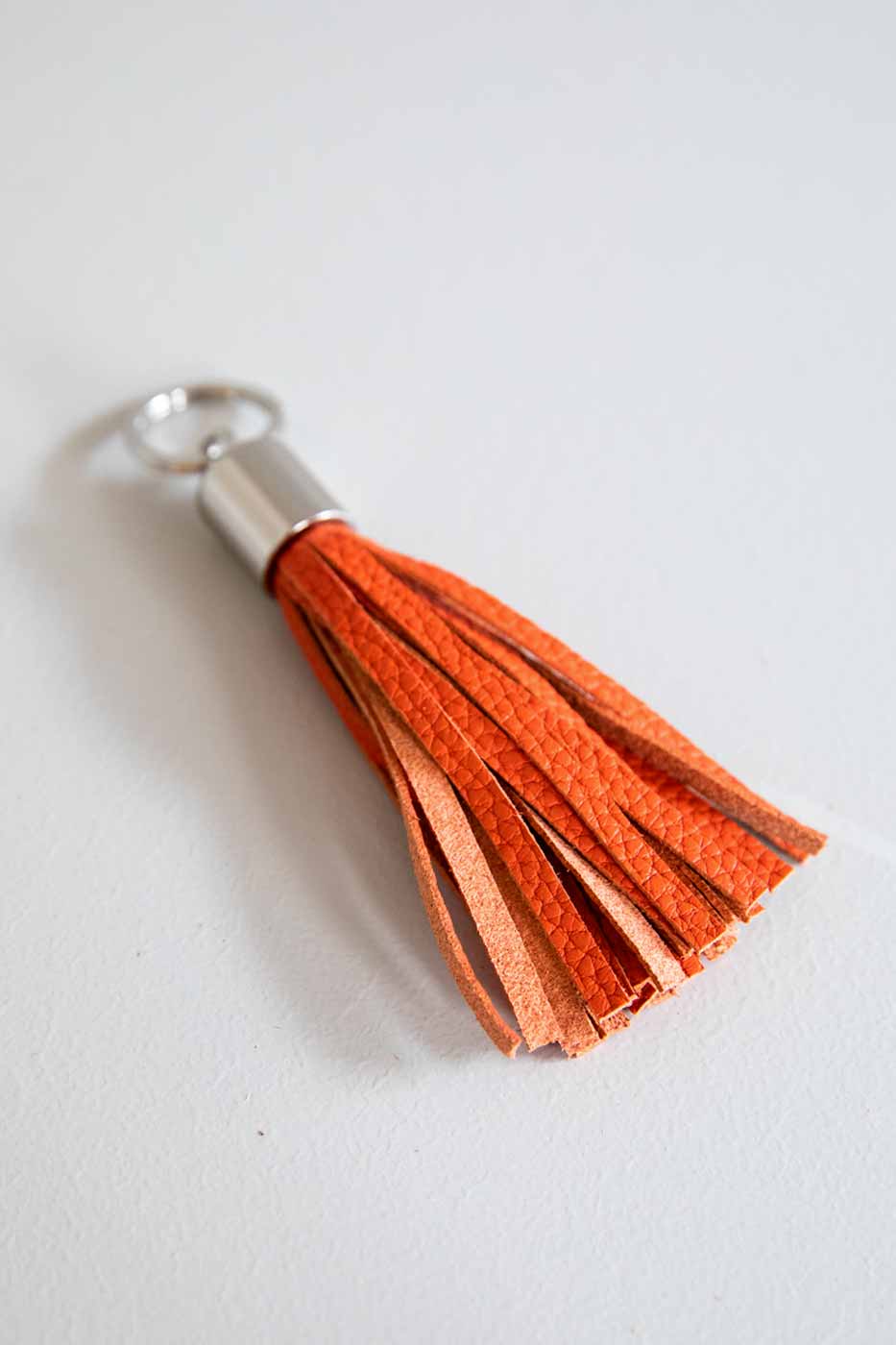 Nyckelring Antibes tofs orange läder